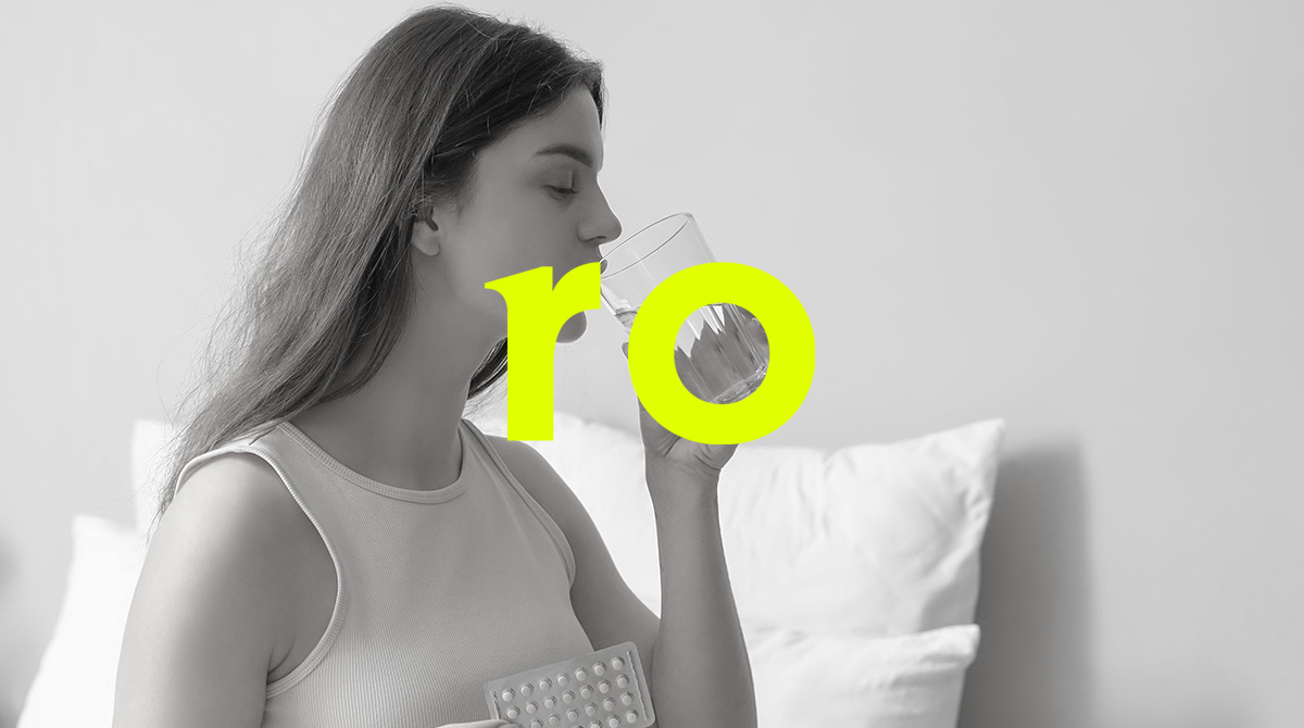 Image of woman taking birth control pills
