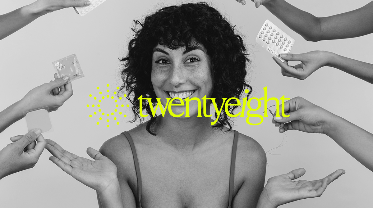 Image of a hand holding a birth control pack